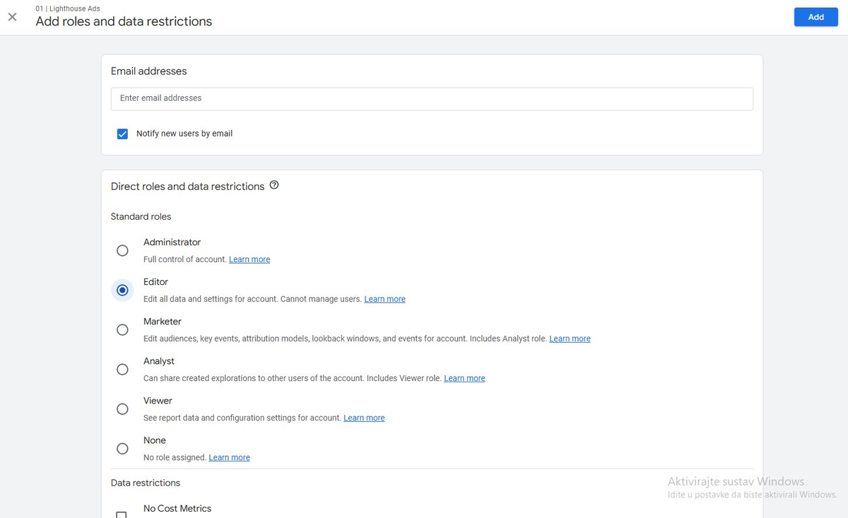 Add roles and data restrictions — polje za email adresu i popis uloga: Administrator, Editor, Marketer, Analyst, Viewer
